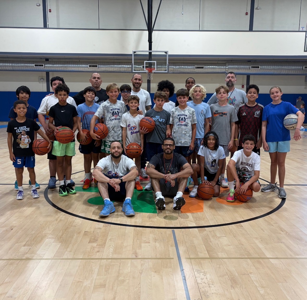 CT Blazers coaches and youth basketball players at a Norwalk clinic