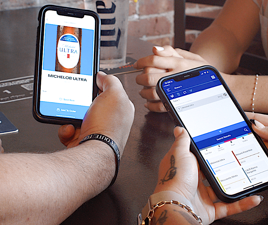 Union POS server taking tableside orders on iPhone handheld POS