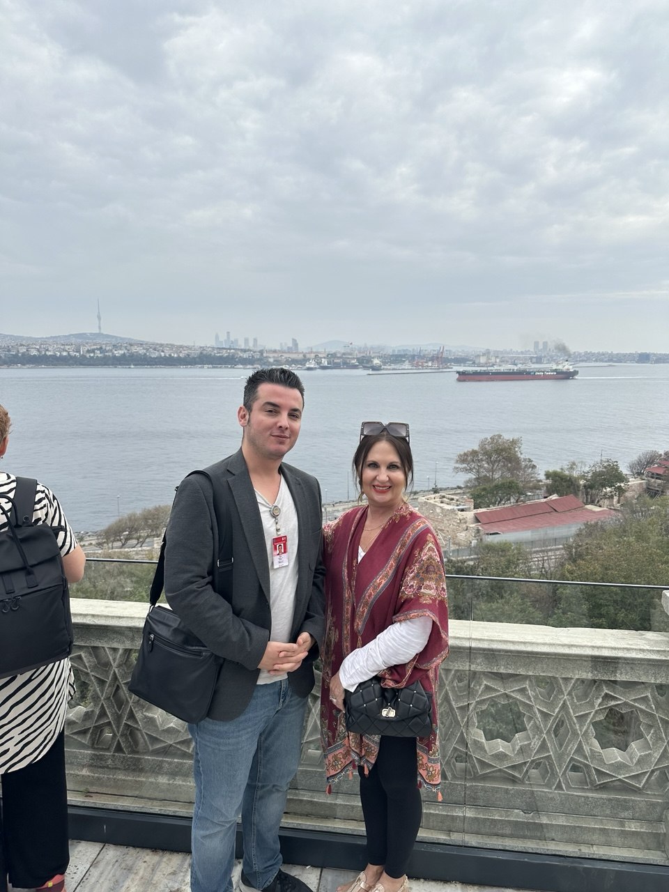 Guide with tour guest on the Topkapi Palace terrace overlooking the Bosphorus