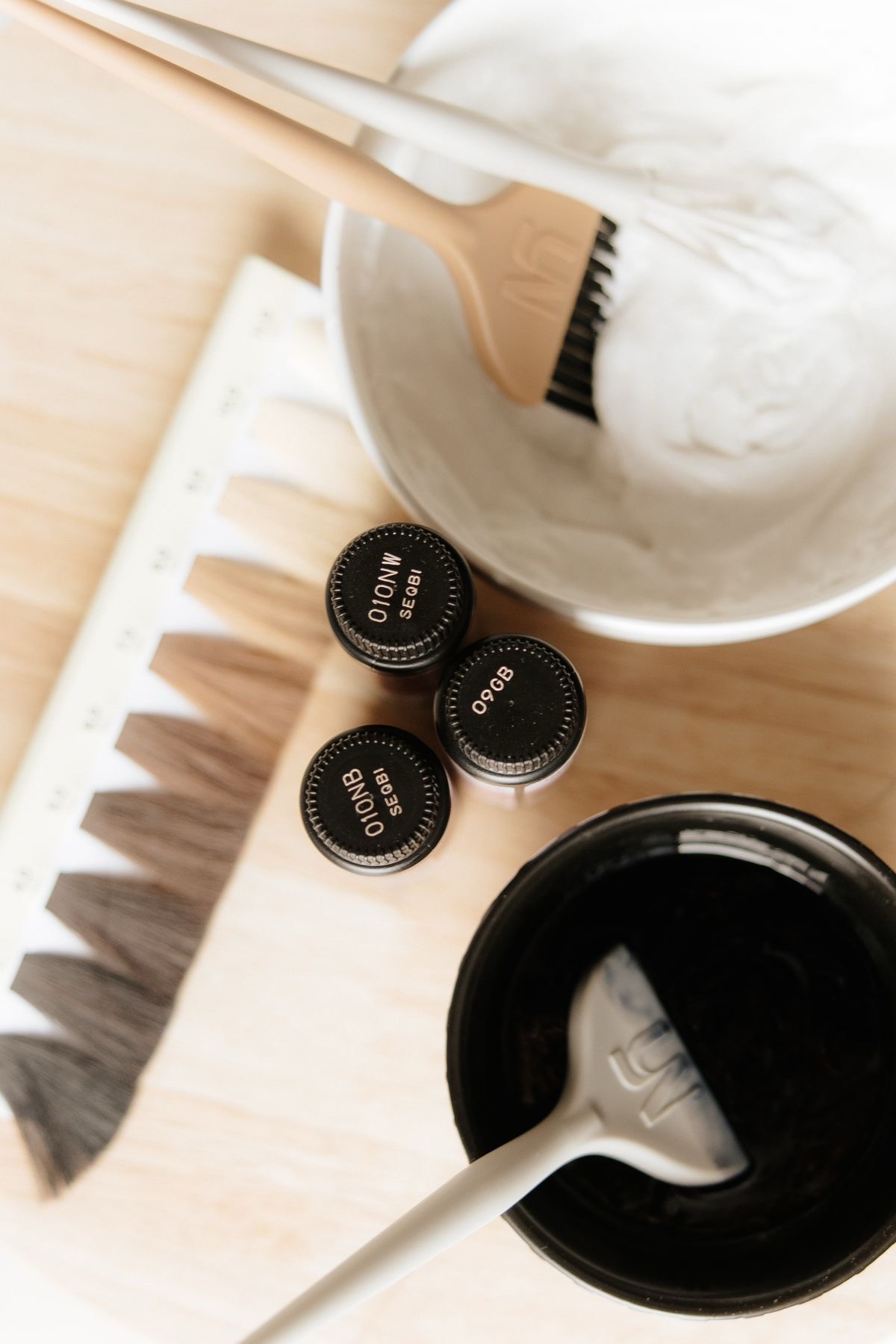 Gloss formulas and hair color swatches