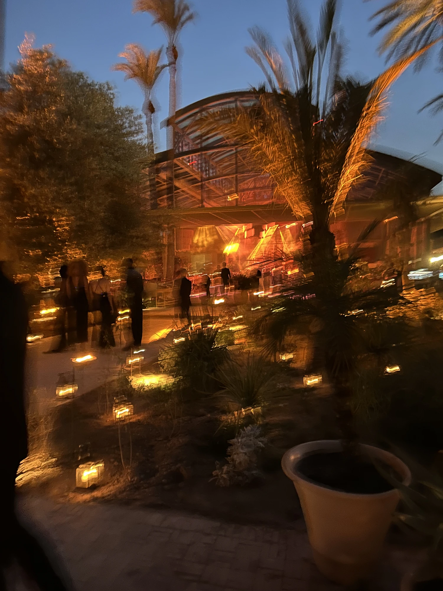 Maya Musings — palace at dusk. lanterns lit. the portal is open.
