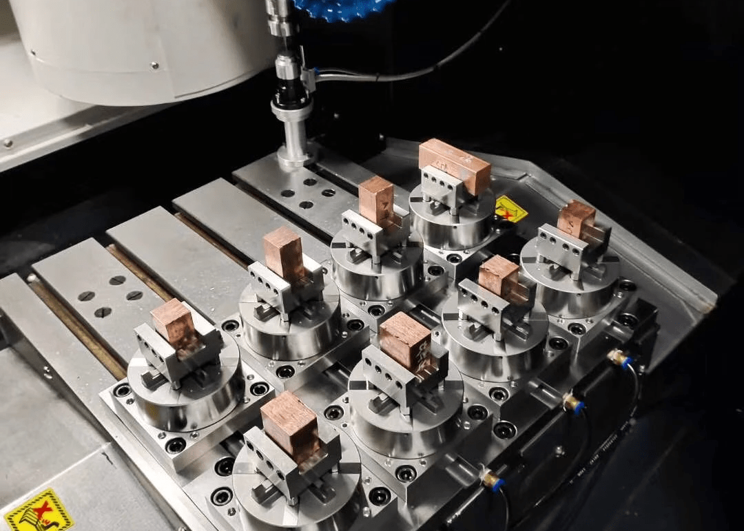 Multi-station chucks holding EDM electrodes