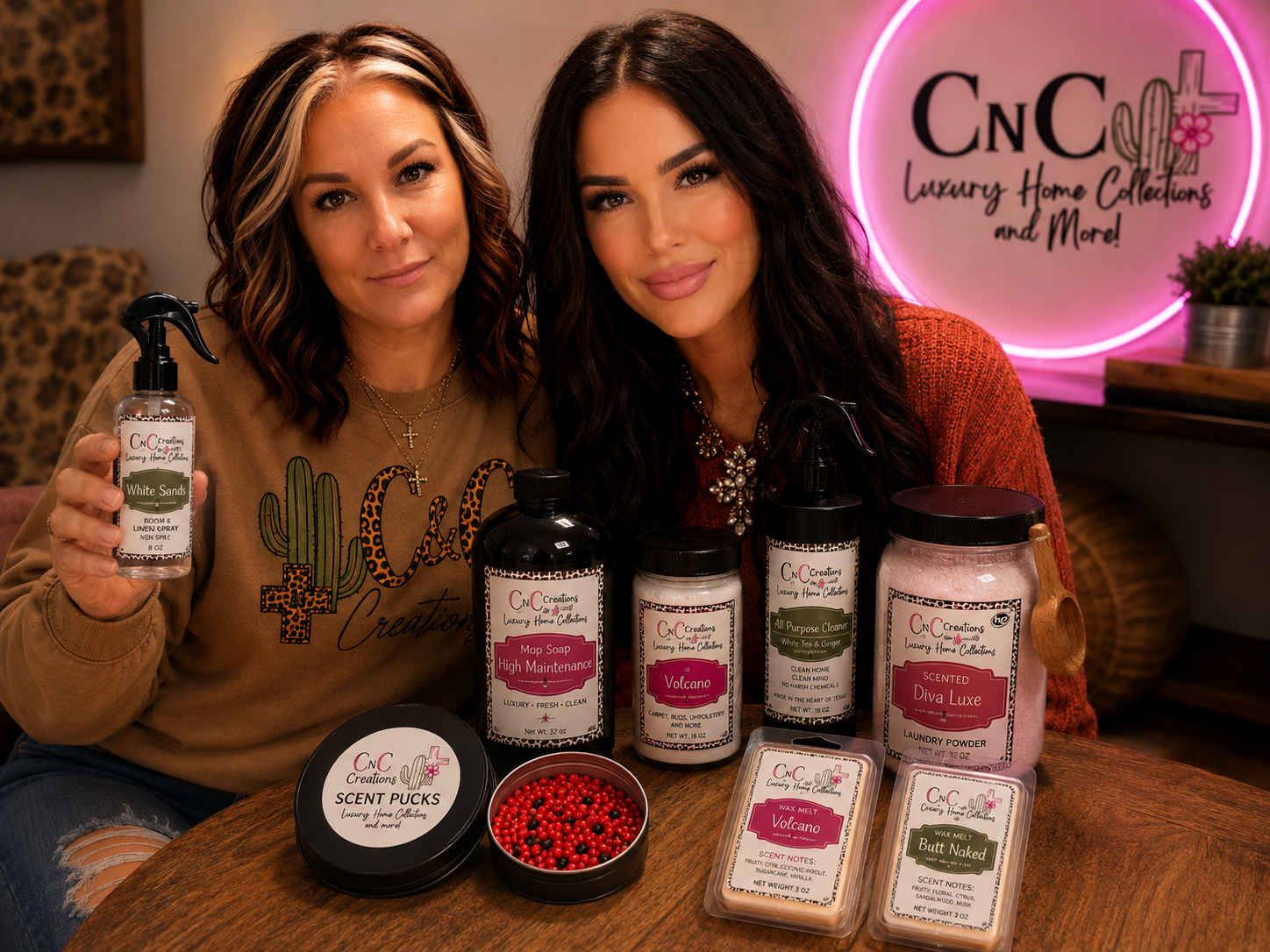 The mother-daughter founders of C&C Creations with their handcrafted products