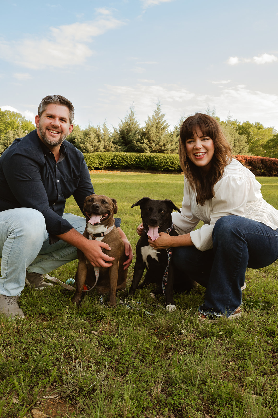 Jess Eisaman with her husband and their two dogs