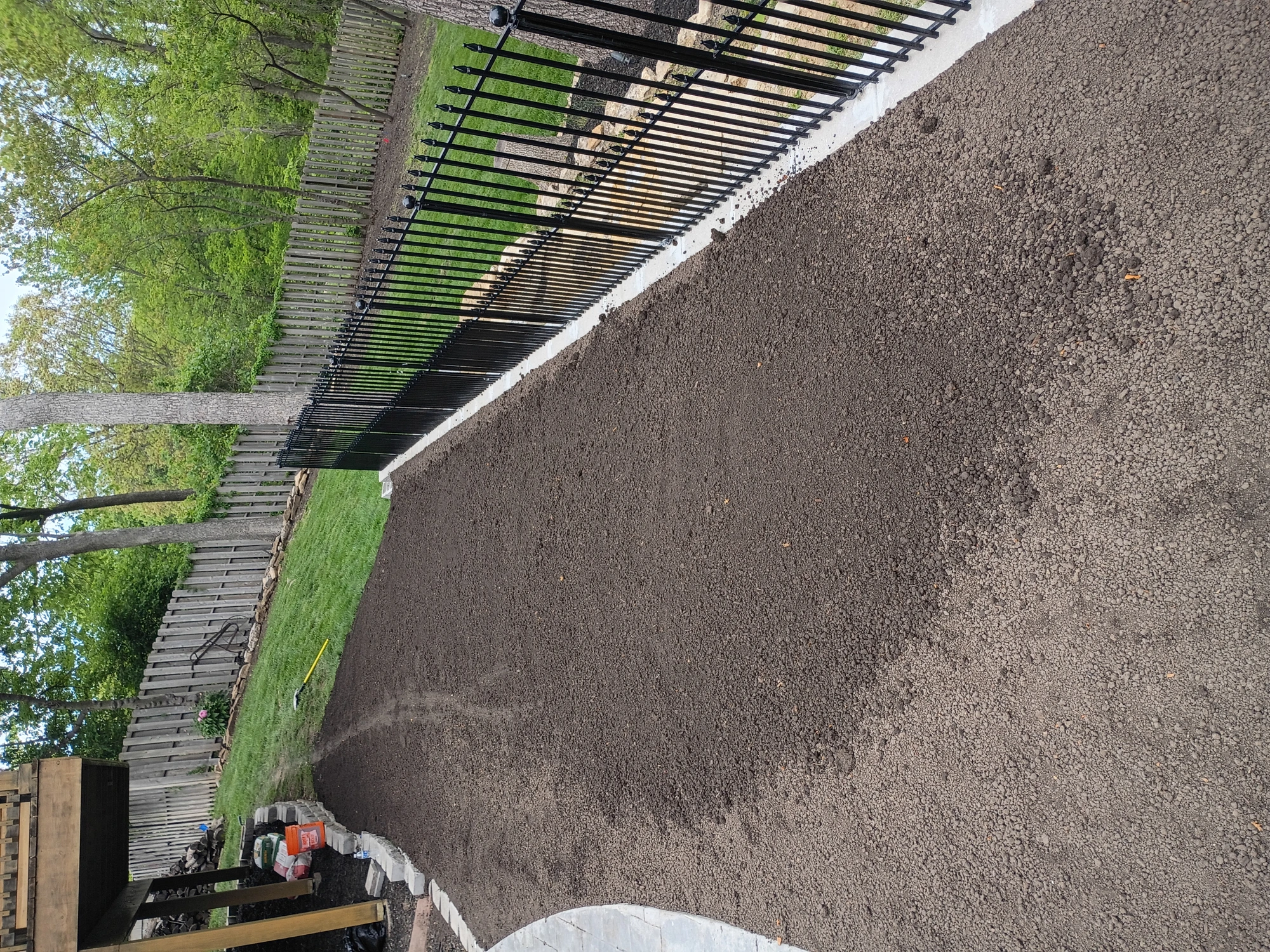 Wrought iron fence with concrete base Kansas City